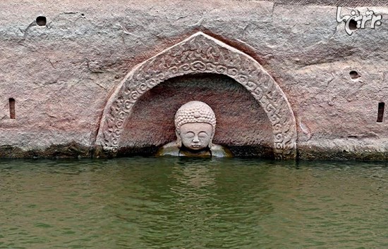 کشف مجسمه 400 ساله بودا زیر دریاچه مصنوعی (+عکس)