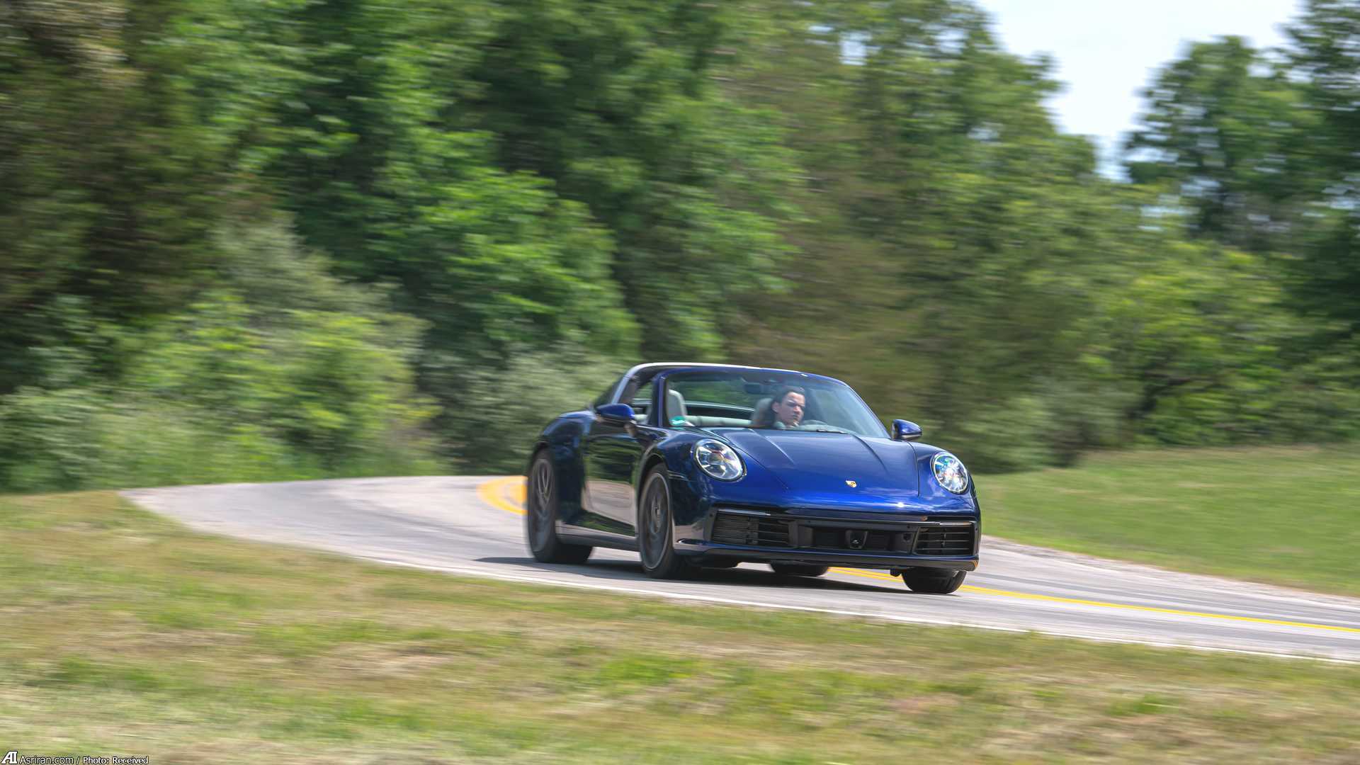 پورشه 911 تارگا 4؛ خودرویی که باتوجه به مکانیسم سقف نامگذاری شده است (+تصاویر) پورشه 911 تارگا 4؛ خودرویی که باتوجه به مکانیسم سقف نامگذاری شده است (+تصاویر)